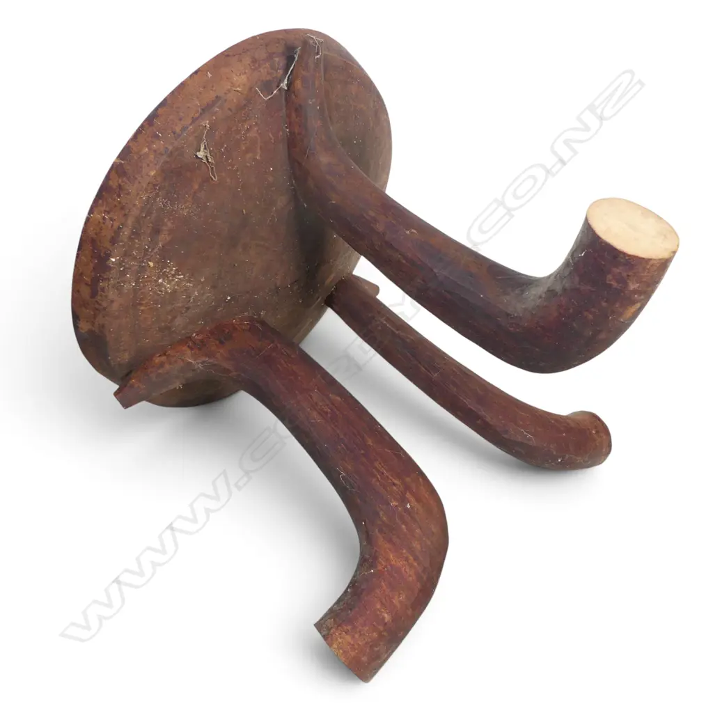 ETHIOPIAN (JIMMA PEOPLE) CARVED TRIPOD WOODEN STOOL WITH DISTINCT HORN SHAPED CURVED LEGS.H.370MM DIA 390MM Image 1++