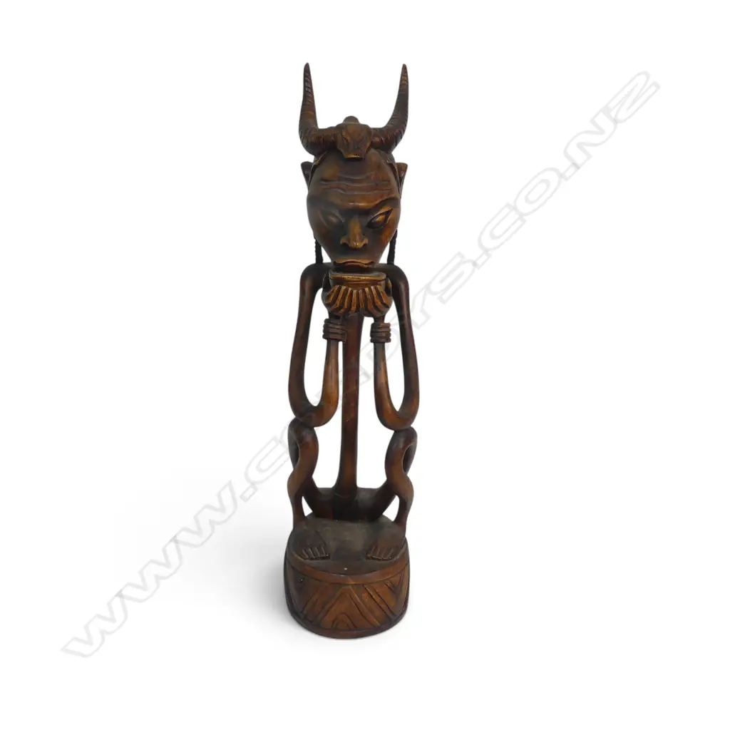 STYLIZED HAND CARVED WOODEN TRIBAL SCULPTURE OF A SEATED HORNED ANCESTOR, 470 X 130MM Image 1++