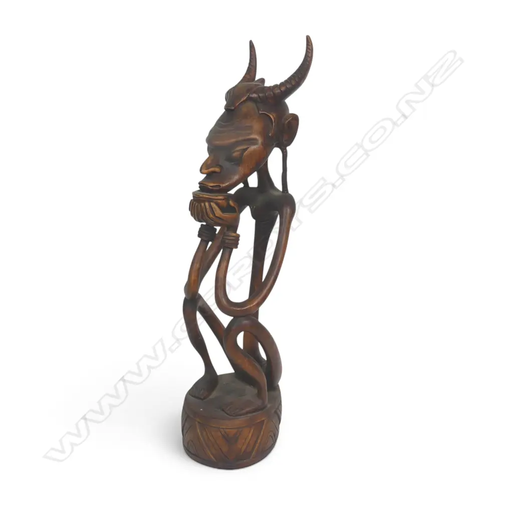 STYLIZED HAND CARVED WOODEN TRIBAL SCULPTURE OF A SEATED HORNED ANCESTOR, 470 X 130MM Image 1++
