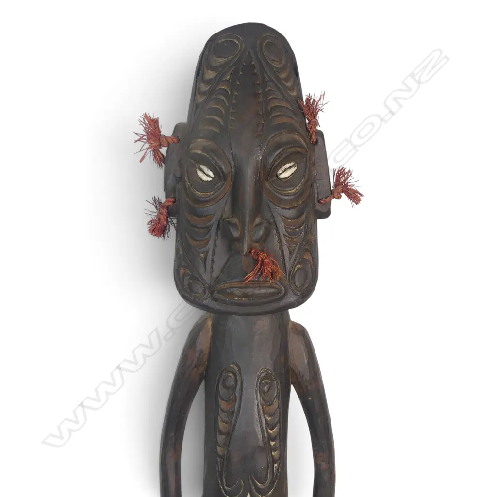 HAND CARVED WOODEN PNG STANDING SPIRIT FIGURE, COWRIE SHELL EYES FIBER AND RAFFIA. H.650MM Image 1++