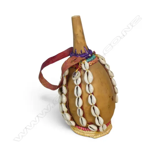 AFRICAN  CALABASH GOURD DECORATED WITH COWRIE SHELLS & RAFFIA, LEATHER STRAP TO CARRY, H.250MM