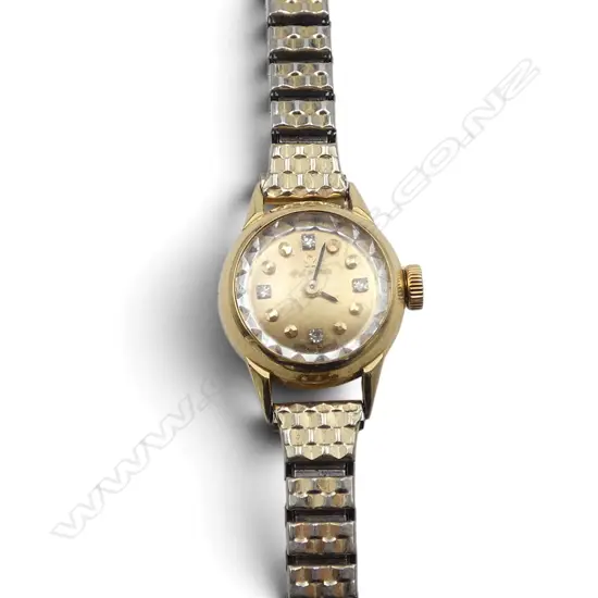 VINTAGE LADIES 9ct GOLD CASED OMEGA WRISTWATCH diamond set dial. Running. Plated strap