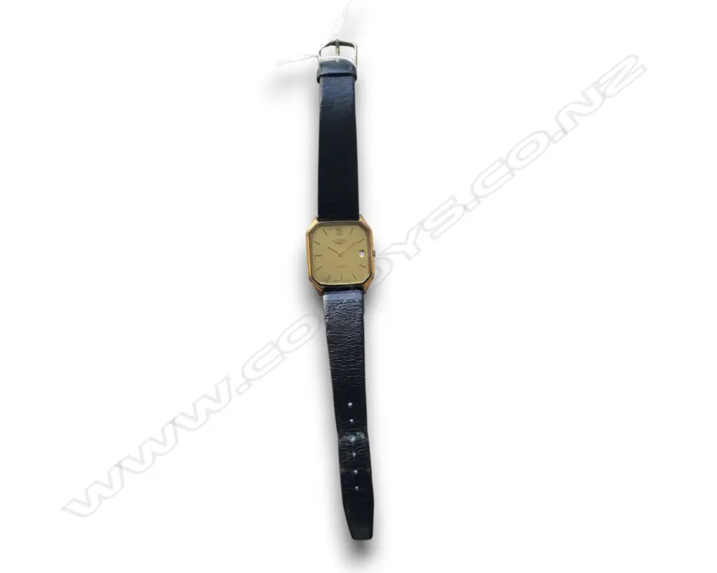 VINTAGE GOLD-TONE QUARTZ DRESS WATCH W A TEXTURED DIAL, DATE WINDOW, BLACK LEATHER STRAP, ORIGINAL ROTARY BOX Image 1++