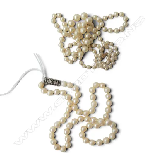 CASED  STRING OF MIKIMOTO PEARLS S/SLIVER CLASP ORIGINAL BOX & ONE OTHER WITH A 9ct CLASP
