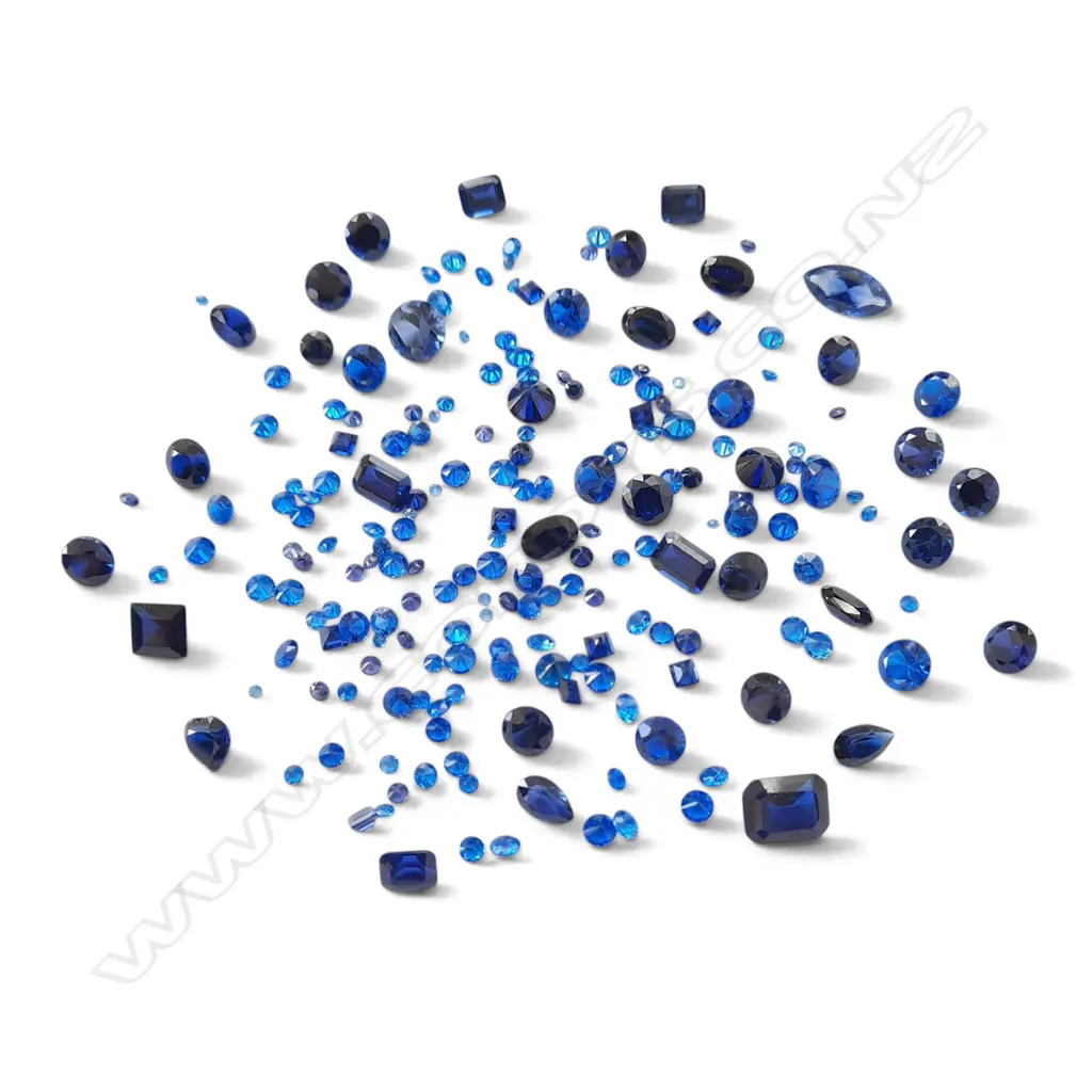 SYNTHETIC BLUE STONES various sizes 38.35cts Image 1++