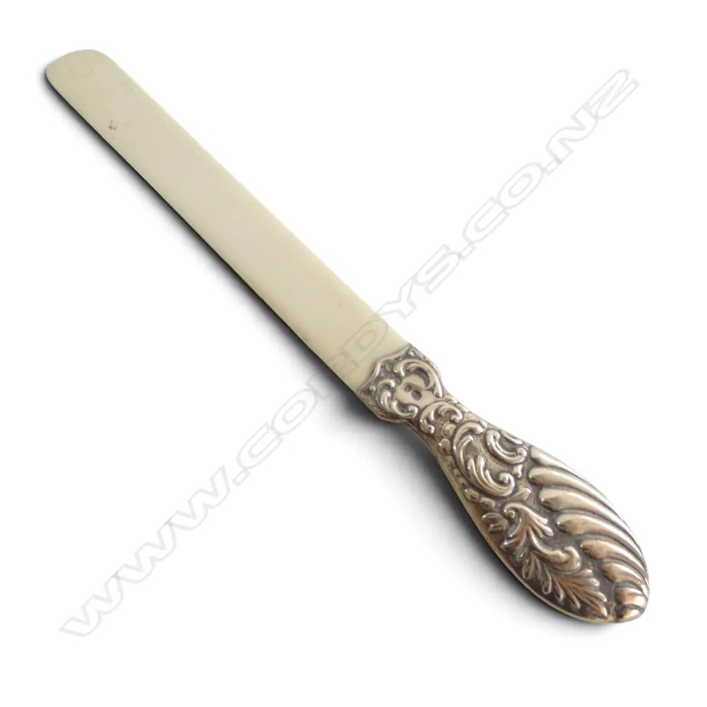 S/SILVER HANDLED IVORY PAGE TURNER Image 1++