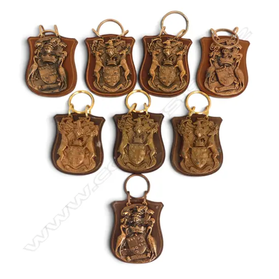 8 BRASS 'GRAHAM' & 'FRASER' ARMORIALS ON LEATHER SHIELDS H.75mm
