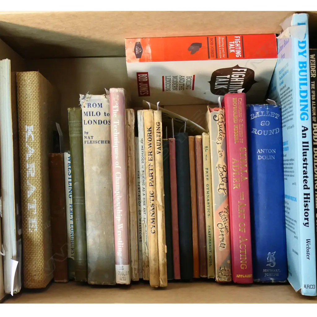 BOXING, WRESTLING, GYMNASTICS AND RELATED BOOKS, 24 VOLS: S K UYENISHI-THE TEXT-BOOK OF JU-JUTSU, NAT FLEISCHER-FROM MIL Image 1++
