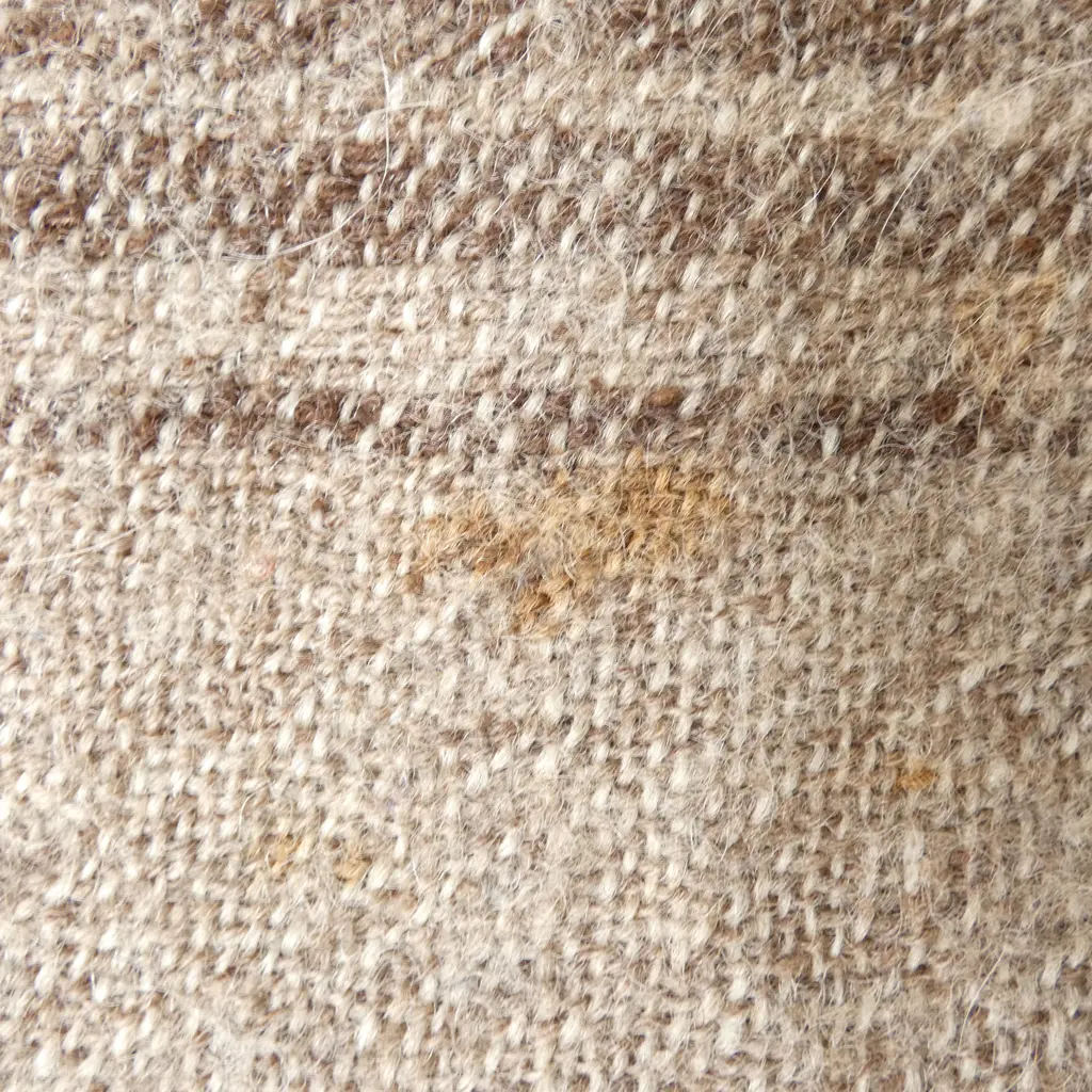 2 X CUSHIONS, ONE WITH WHITE SHEEPSKIN & A WOOLEN KNEE RUG ( SOME MARKS) Image 1++