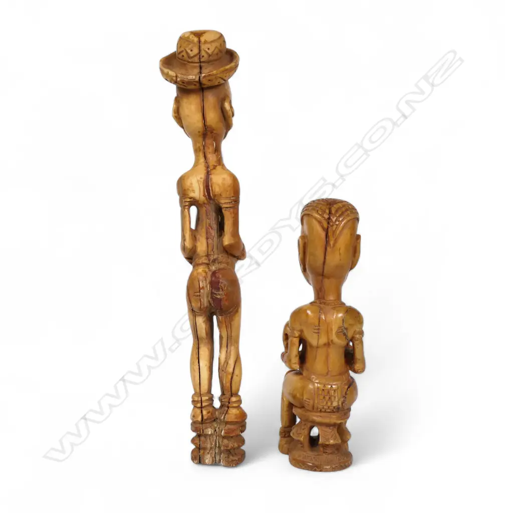 A pair of early 20thC Nigerian carved ivory figures, Image 1++
