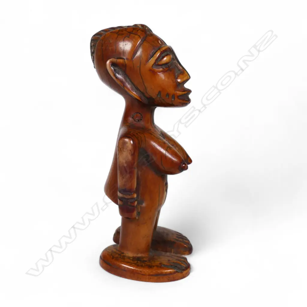 An early 20thC Nigerian Ere Ibeji ivory figure, Image 1++