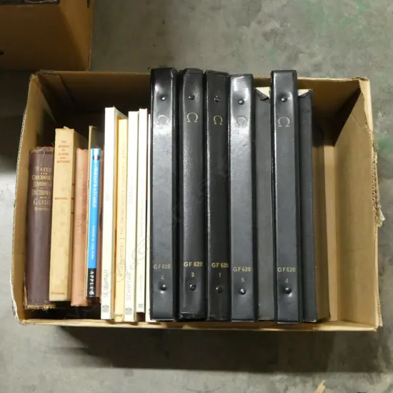 BOX OF CLOCK & WATCH BOOKS WITH 7 OMEGA CATALOGUES