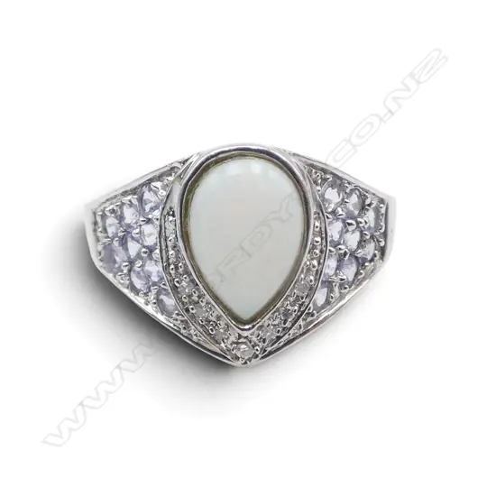 10CT WG OPAL LAVANDER SIDE STONES RING 5.3gms SIZE T