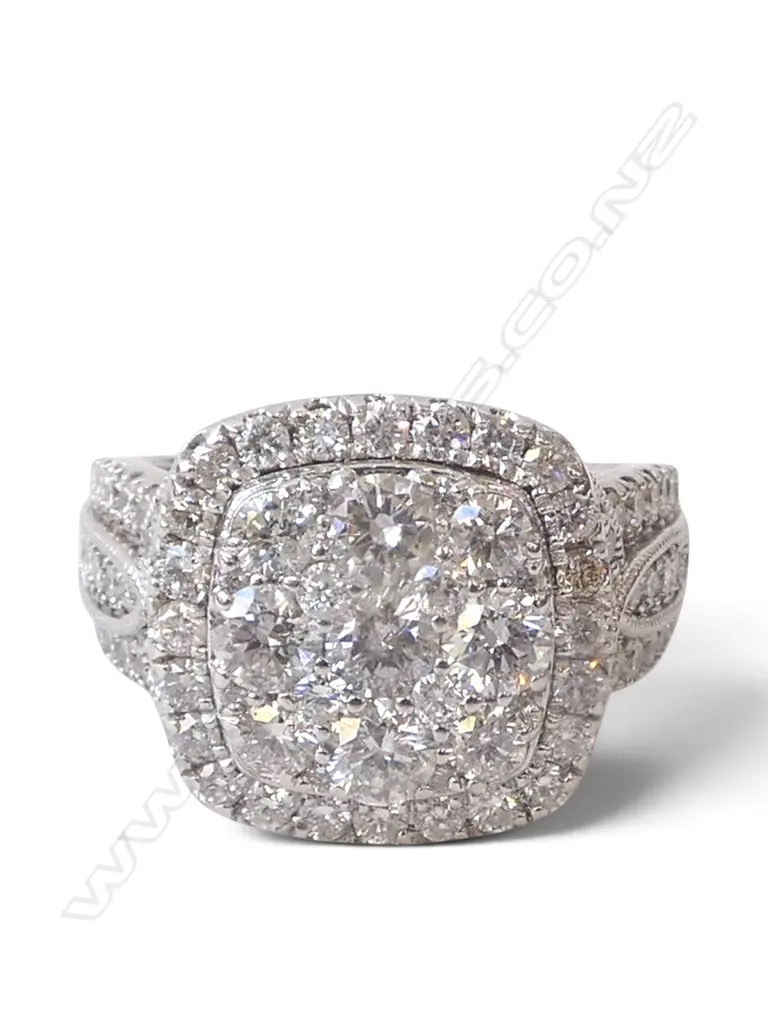 # A 10ct white gold and large diamond cluster ring, TDW. 3cts. SIZE T Image 1++