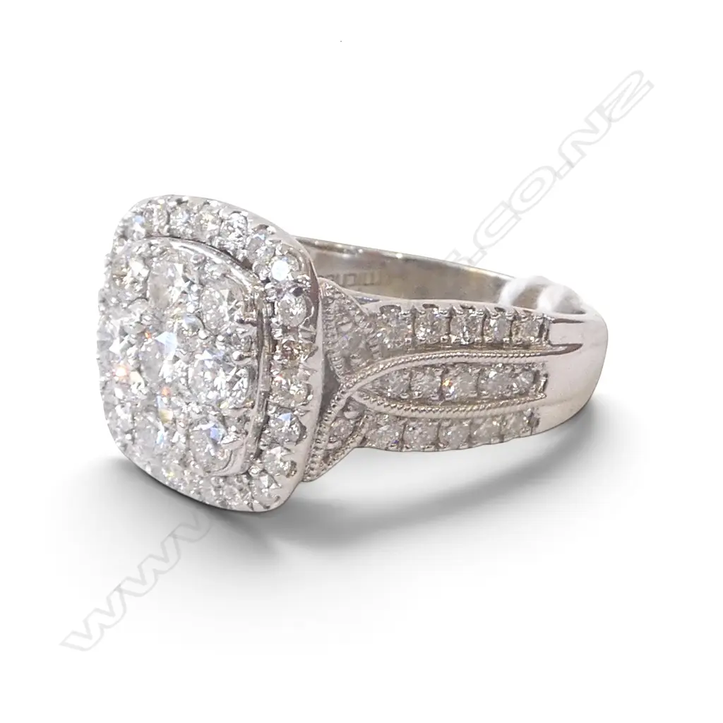 # A 10ct white gold and large diamond cluster ring, TDW. 3cts. SIZE T Image 1++