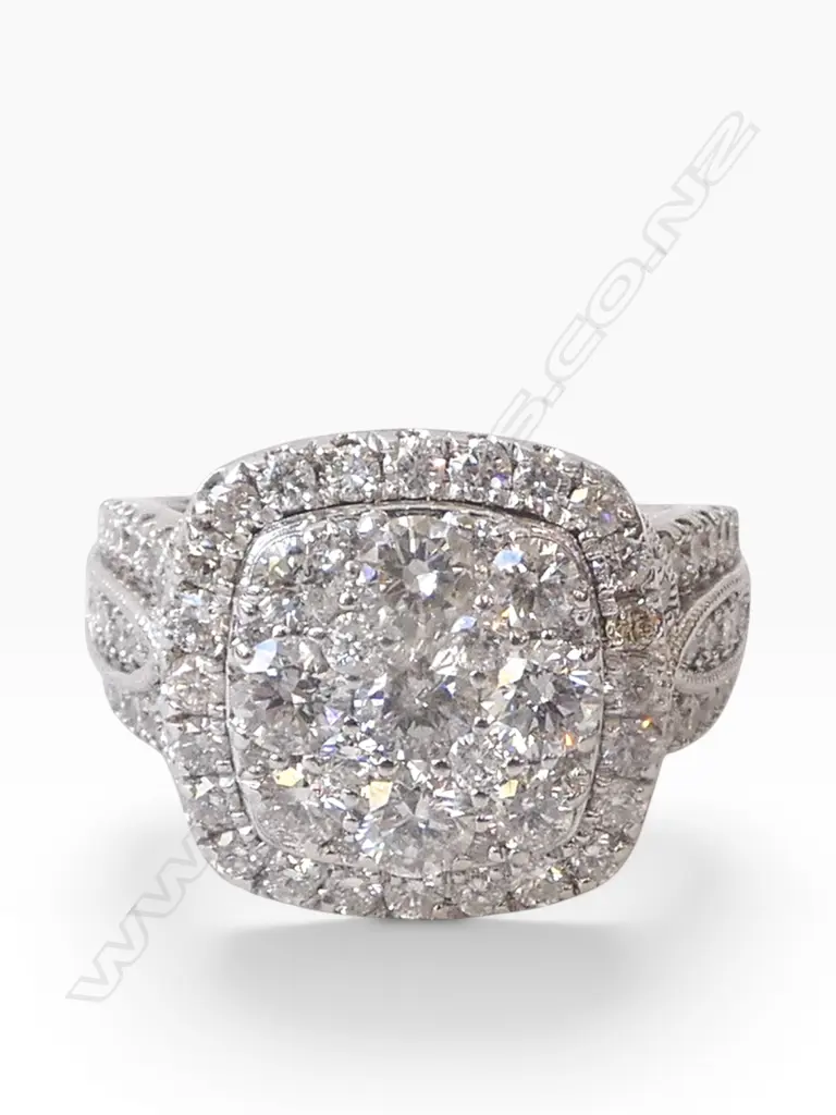 # A 10ct white gold and large diamond cluster ring, TDW. 3cts. SIZE T Image 1++