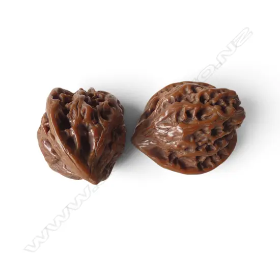 2 ORIENTAL LGE POLISHED PEACH STONES