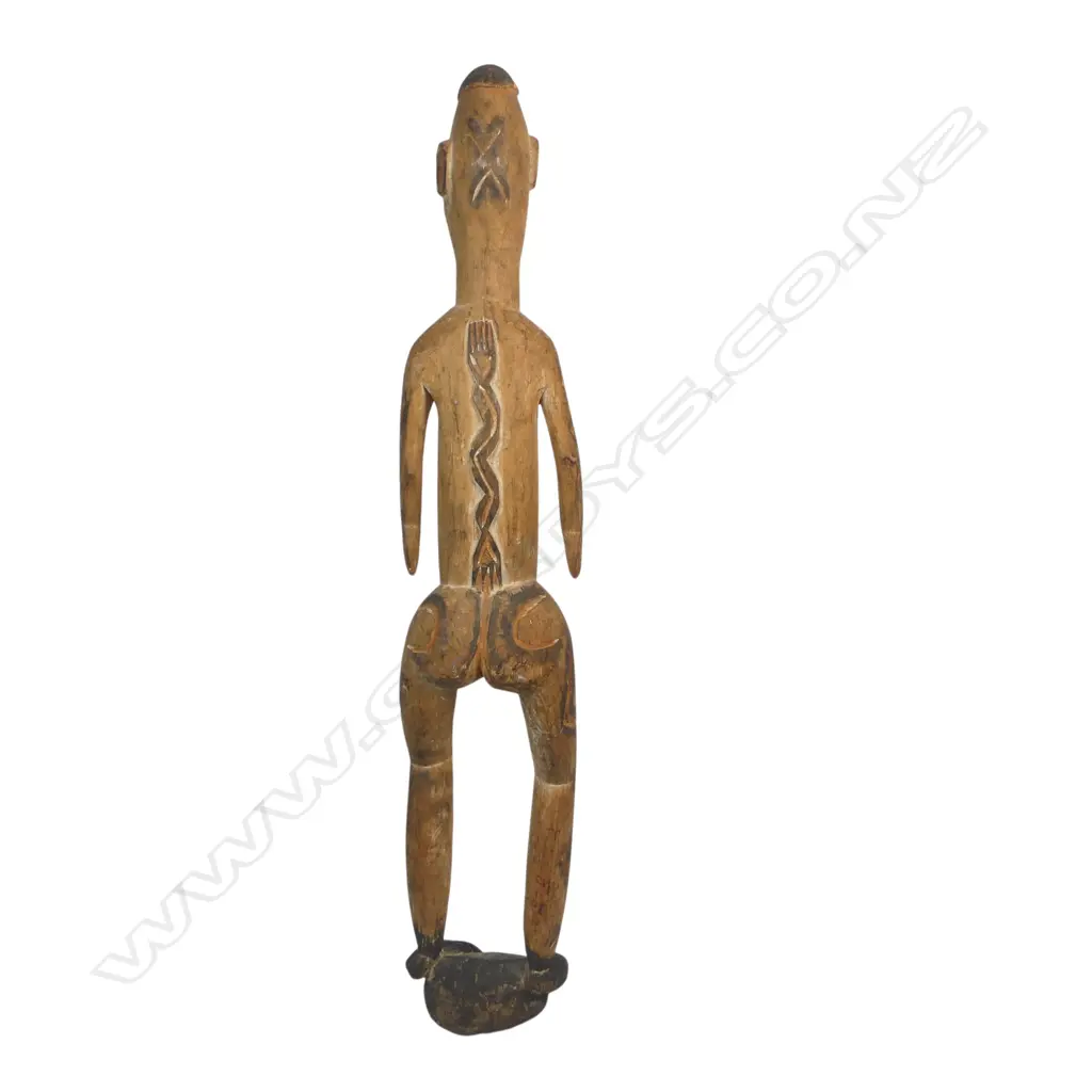 PNG carved wooden standing figure, ochre & black stain, H.760mm Image 1++