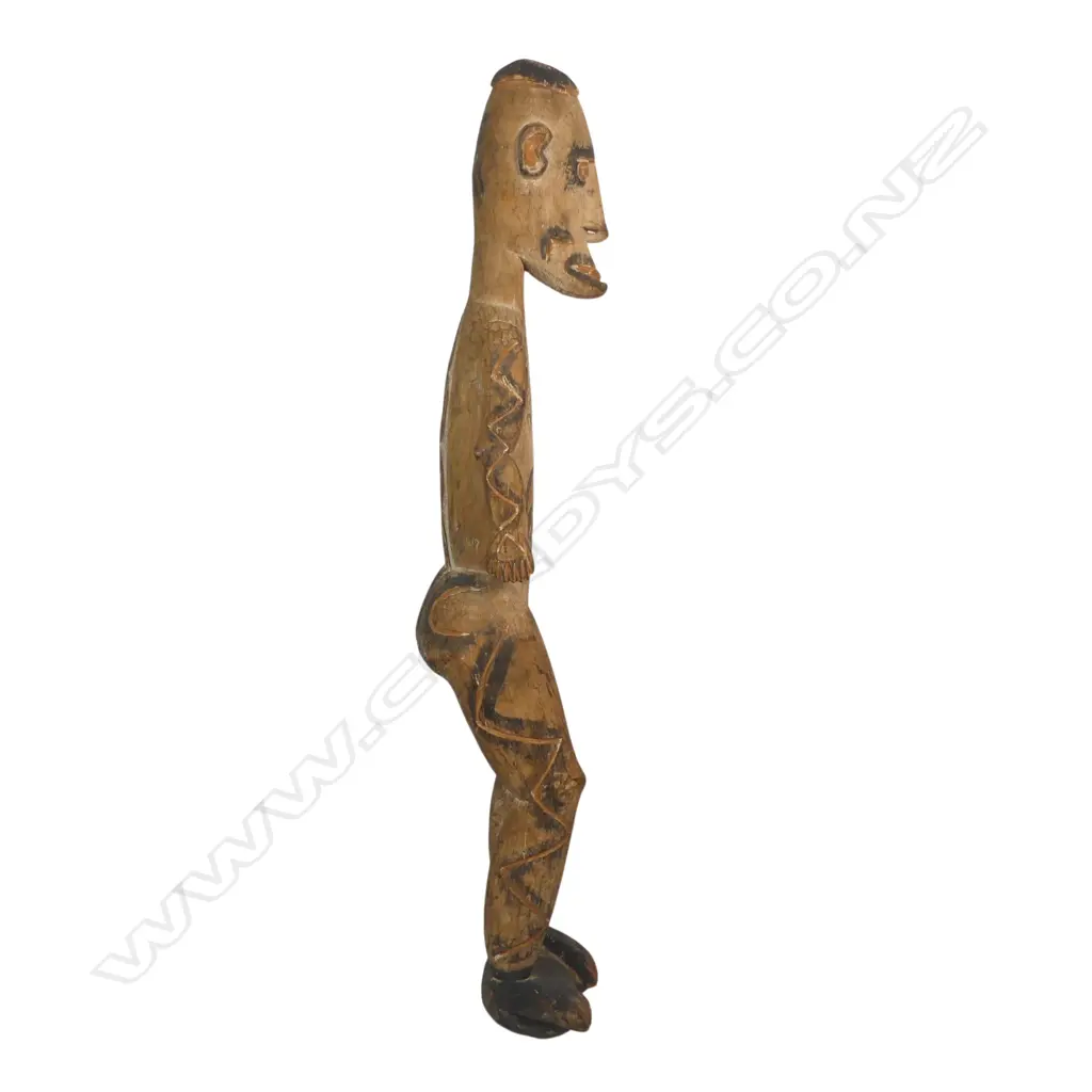 PNG carved wooden standing figure, ochre & black stain, H.760mm Image 1++