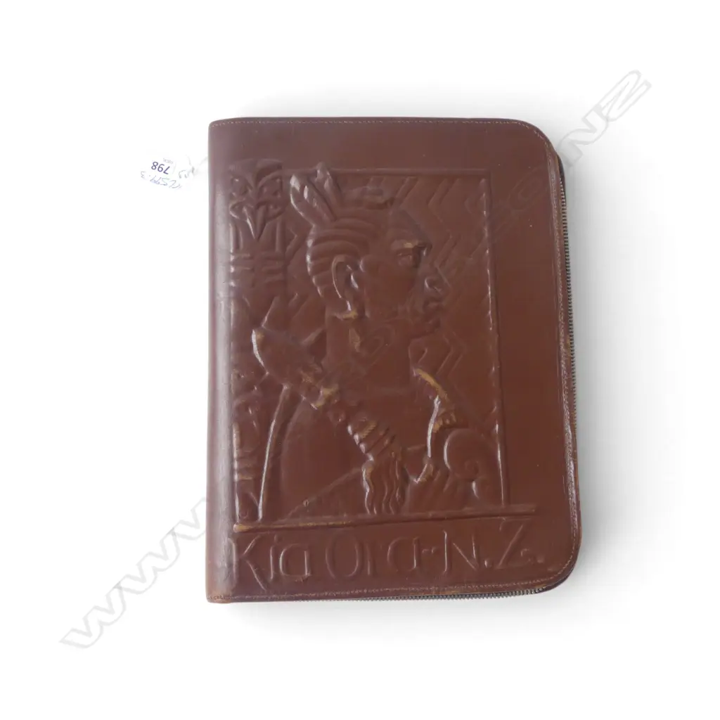 EMBOSSED LEATHER 'KIA ORA' FOLDER H.285mm Image 1++