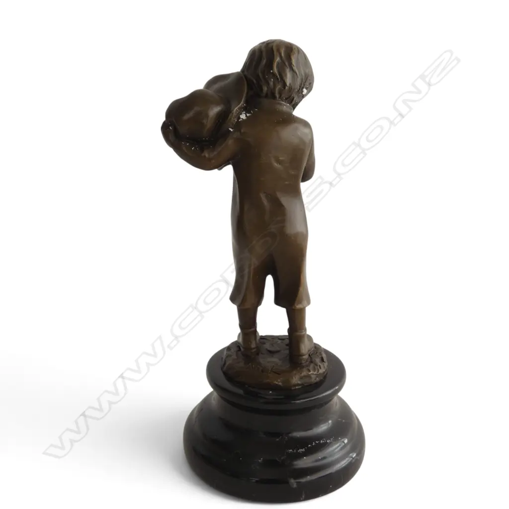 Contemporary bronze 'The Smoker Boy' signed 'Nick' on black marble base. H.215mm. Shielding the flame with his hat. Image 1++