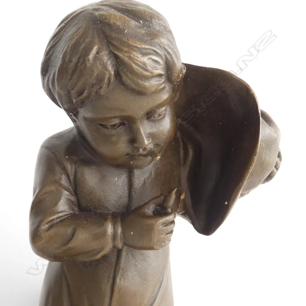 Contemporary bronze 'The Smoker Boy' signed 'Nick' on black marble base. H.215mm. Shielding the flame with his hat. Image 1++