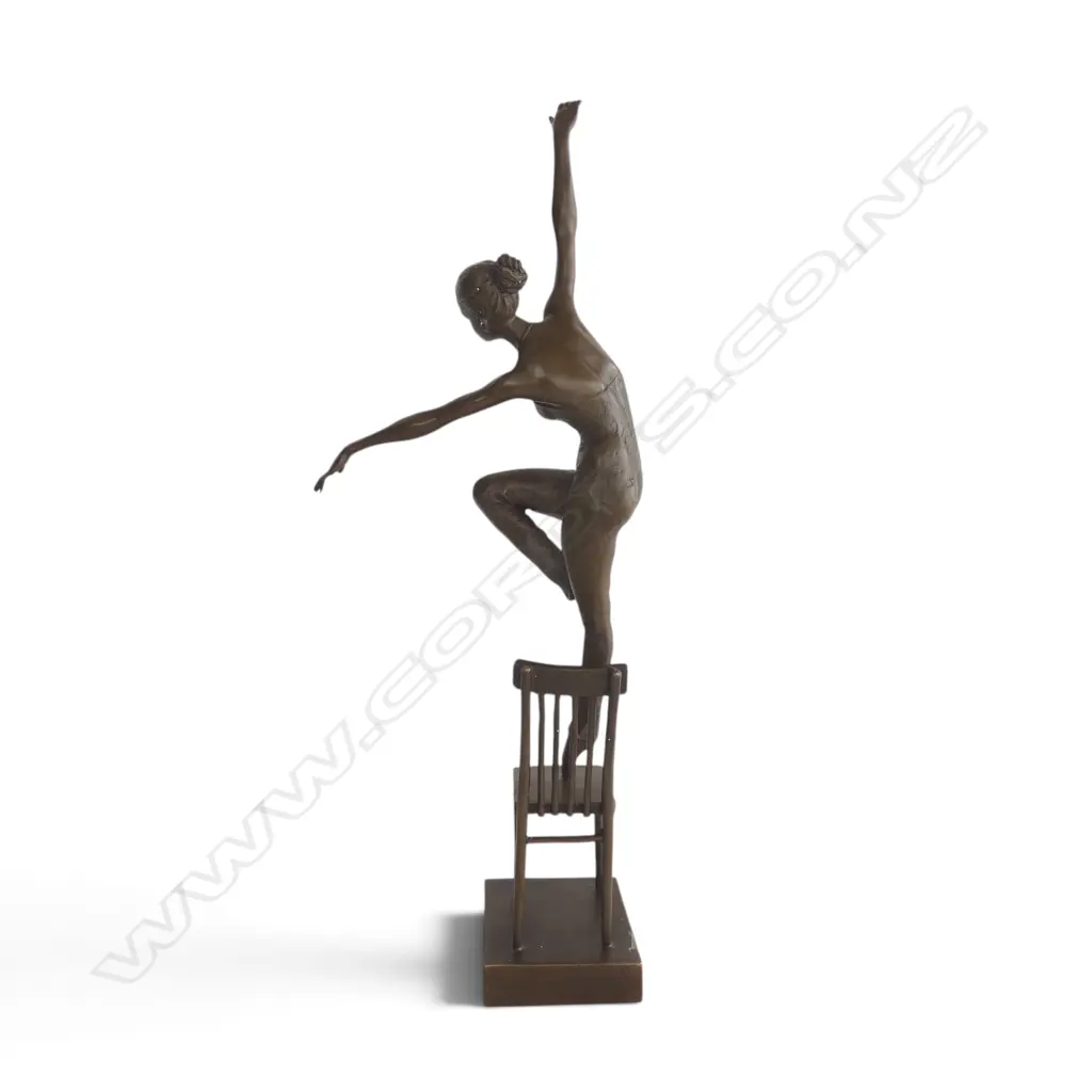 Contemporary bronze of a ballerina dancer on a chair in dynamic pose. The chair signed 'Nick'. H.485mm. Image 1++