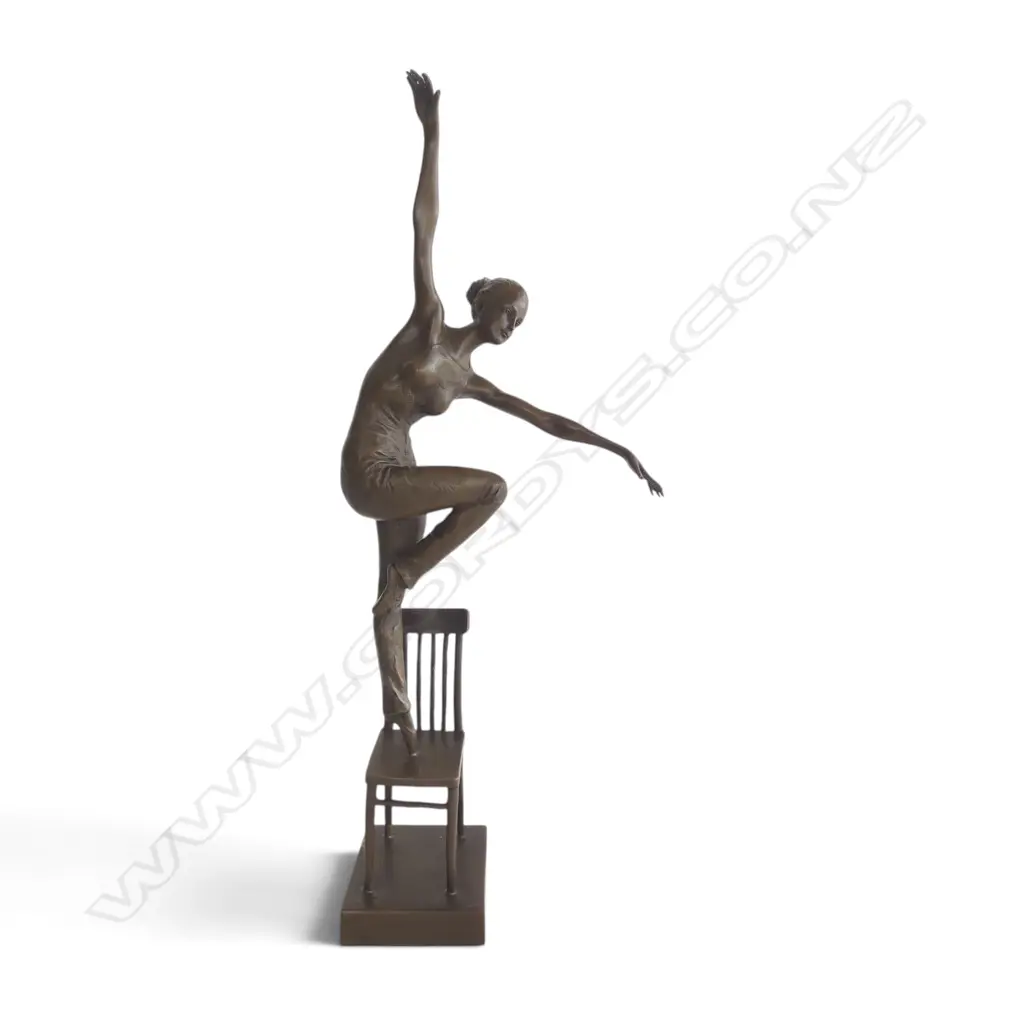 Contemporary bronze of a ballerina dancer on a chair in dynamic pose. The chair signed 'Nick'. H.485mm. Image 1++