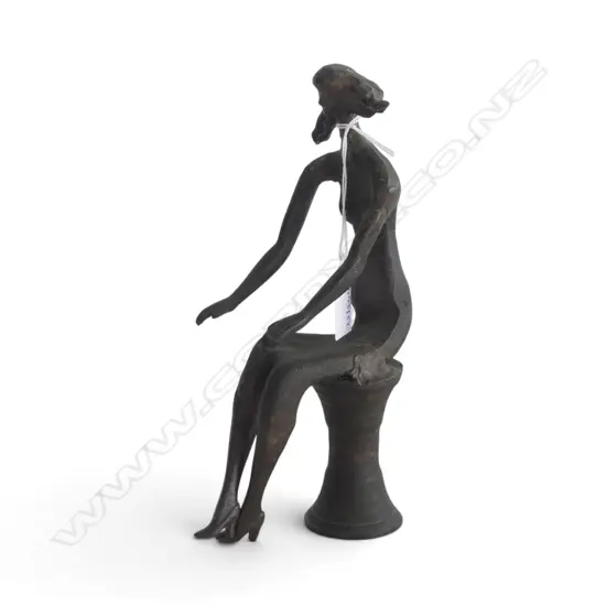 BRONZE STATUETTE OF A SEATED WOMAN WITH FLOWING HAIR H215MM