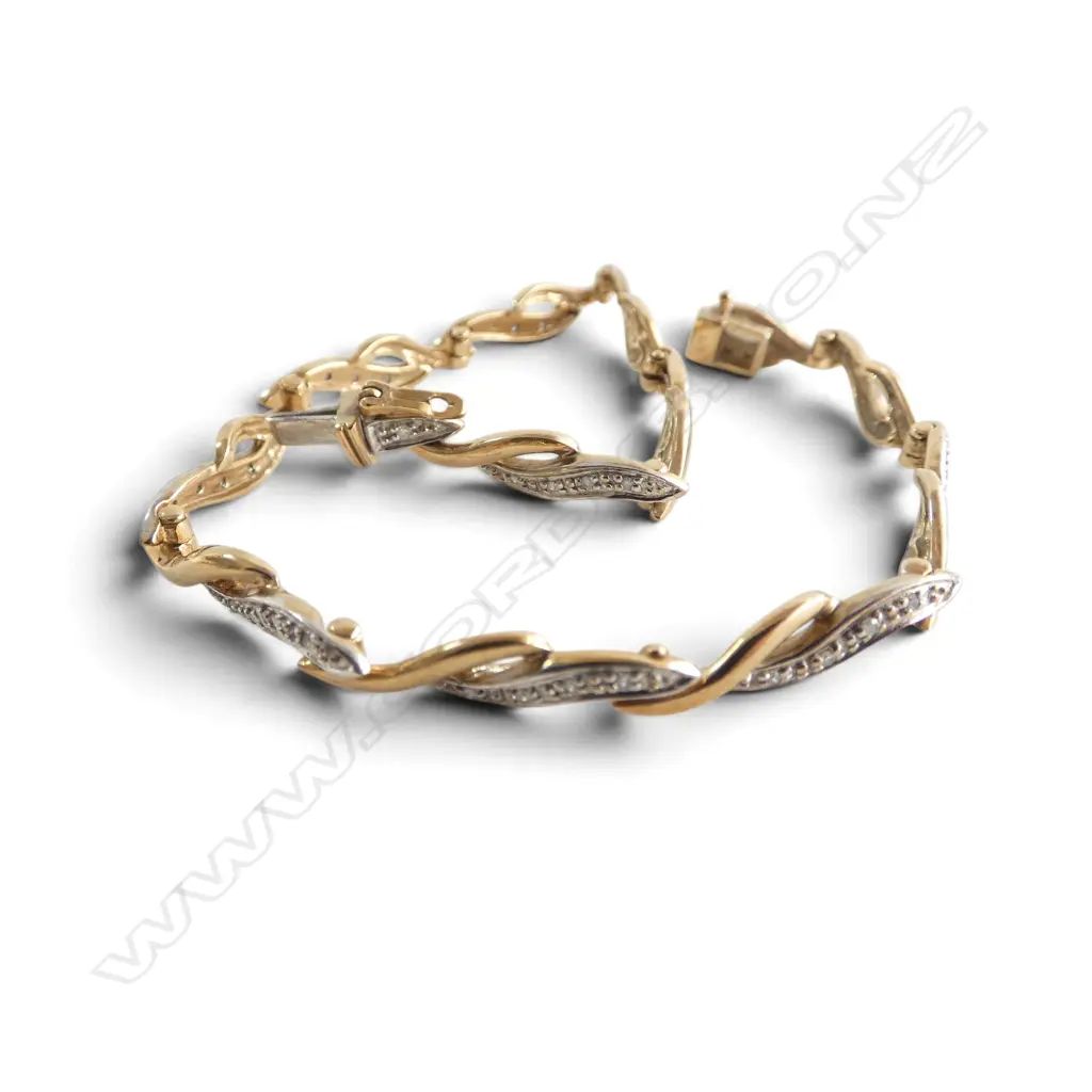 9CT GOLD AND DIAMOND BRACELET 8.39gms Image 1++