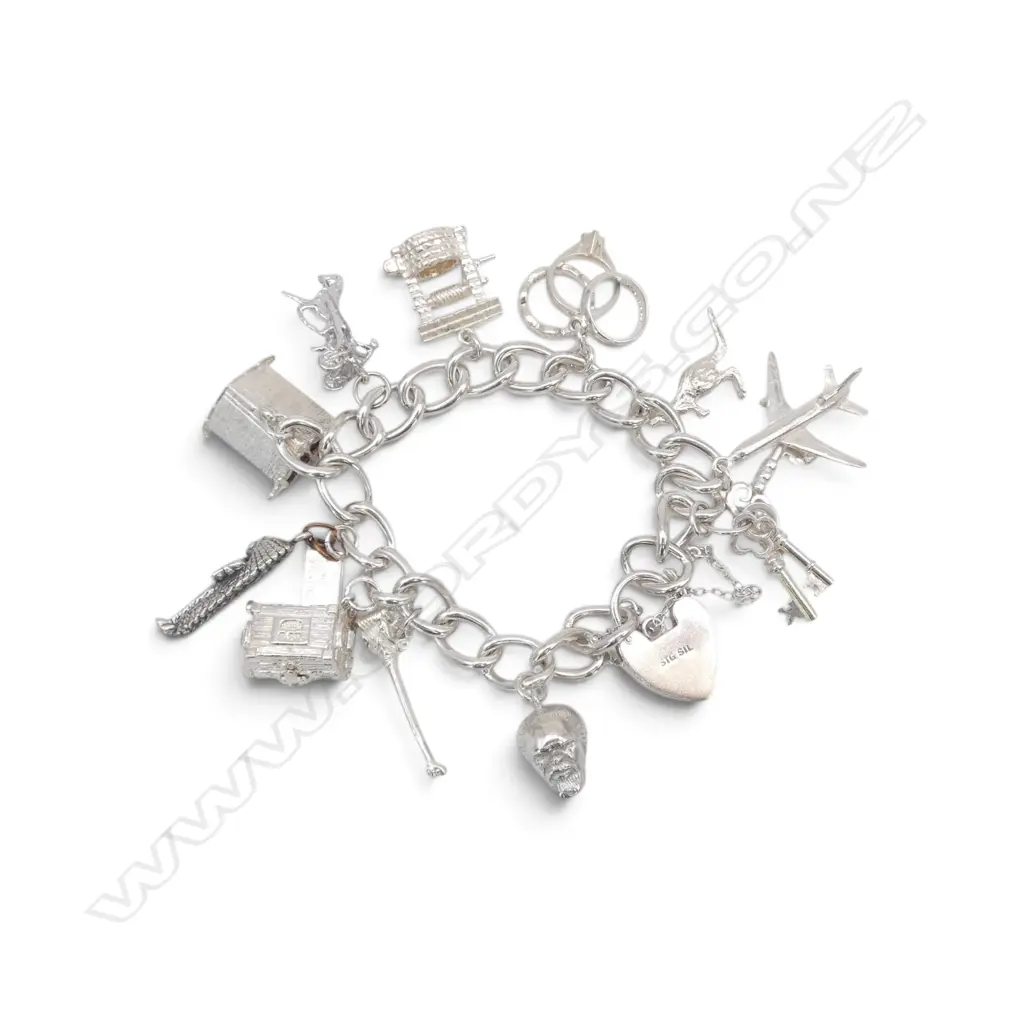 .925 SILVER CHARM BRACELET 64.45gms Image 1++