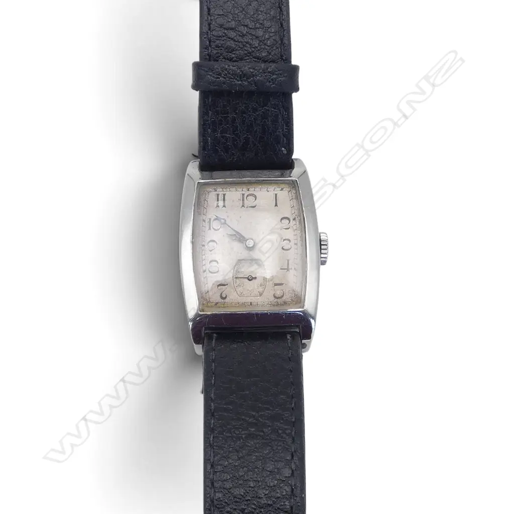 An Art Deco Longines tonneau shaped wristwatch, Image 1++