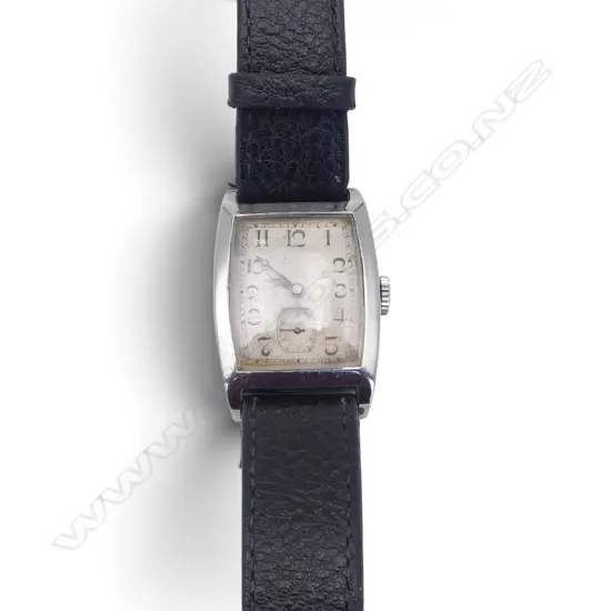 An Art Deco Longines tonneau shaped wristwatch,