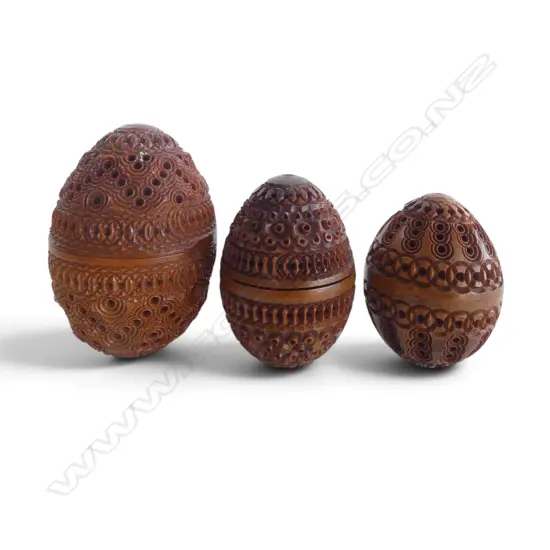 3 VICTORIAN COQUILLA NUT SEWING CASES IN CARVED EGG SHAPE, H.70mm H.60mm H.55mm