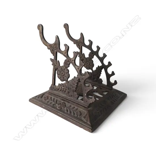 Victorian cast iron pen stand. 2 arched brackets to hold 7 pens, H.130mm