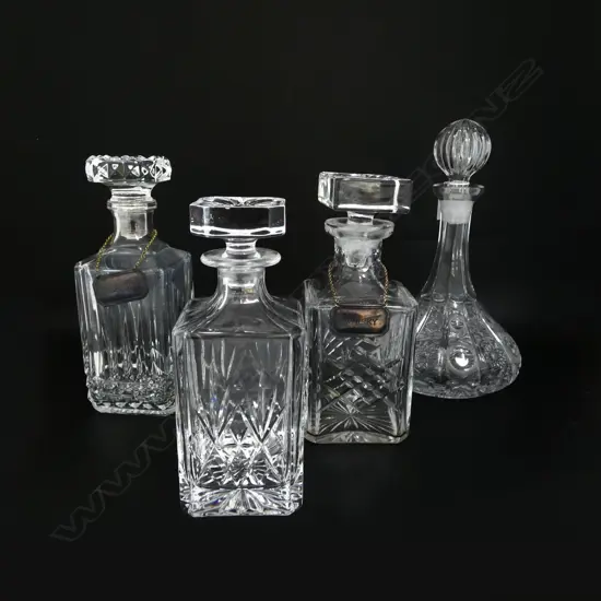 4 CRYSTAL DECANTERS, 2 w. EP TAGS H.300mm