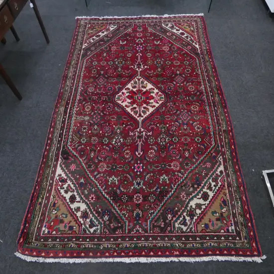 HAND KNOTTED WOOL PILE RUG