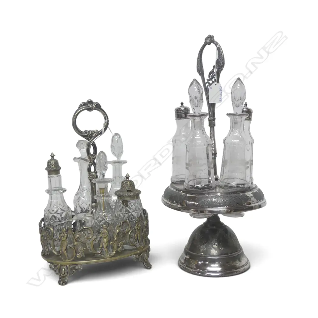 VICTORIAN SILVER PLATE CRUET SET, repeating pierced scroll & putti design H.320mm + CRUET SET one missing from each set Image 1++