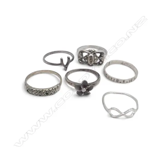 6 SILVER RINGS some set with stones. 1 broken 10gms