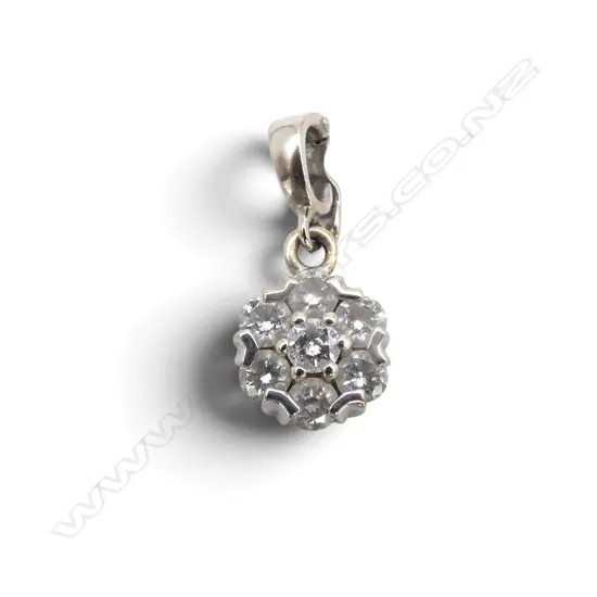 18CT WHITE GOLD AND DIAMOND PENDANT TDW.0.57ct (old valuation) 1.40gms