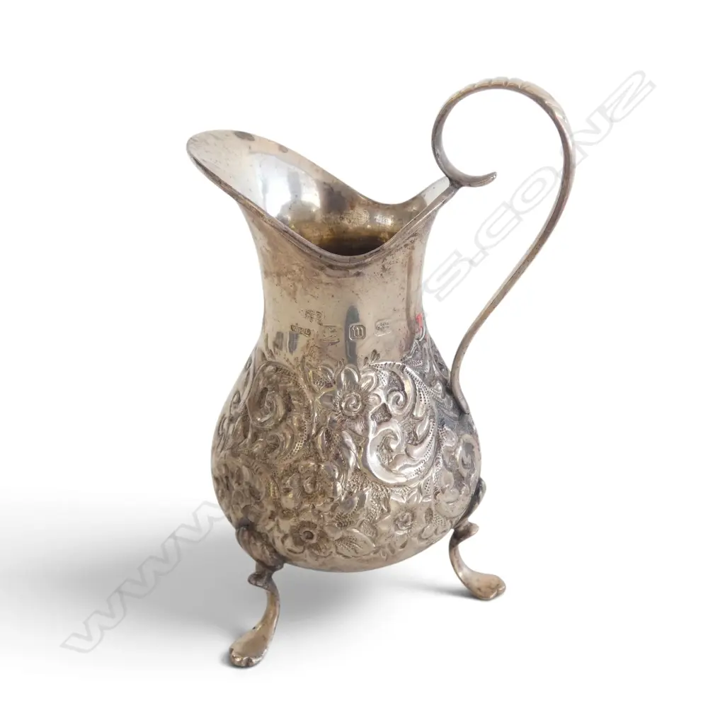 London 1896 SILVER EMBOSSED TRIPOD CREAM JUG. 77gms  Image 1++