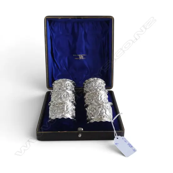 CASED SET OF 6 EMBOSSED SILVER NAPKIN RINGS Sheffield 1901. 147gms. In original fitted box