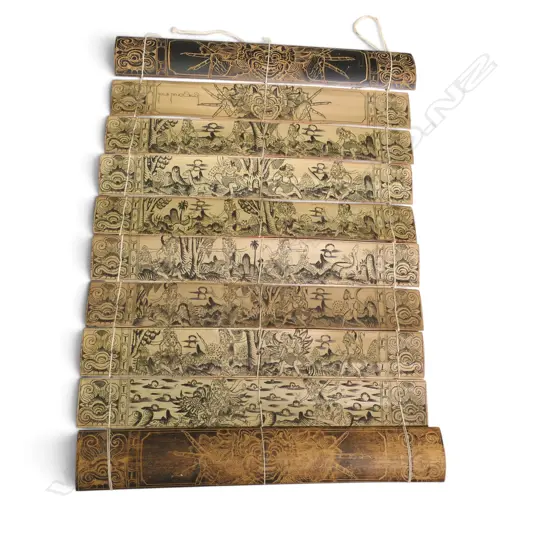 TRADITIONAL  INDONESIAN SCROLL MADE OF ENGRAVED PALM LEAVES FEATURING THE RAMAYANA, 260 X 370MM