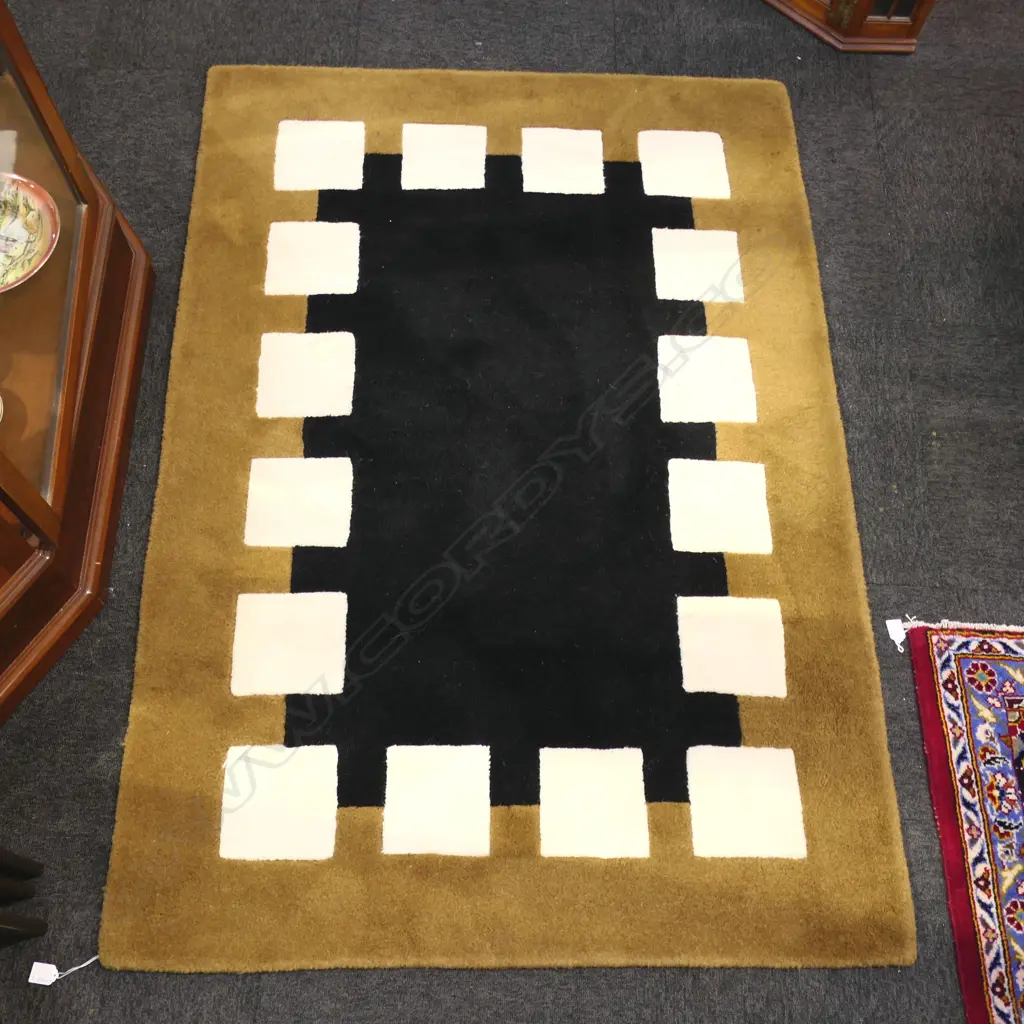 PURE WOOL HAND MADE BARRY SALOMON'S GOUGER RUG. 1100 X 1600MM Image 1++