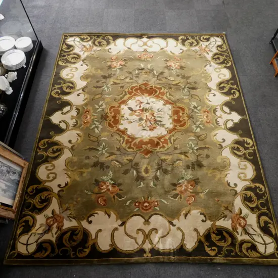 LARGE INDIAN WOOL RUG 2400 x 3000mm. Scrolling designs green & other tones