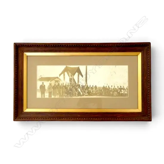 VINTAGE PANORAMIC PHOTO GATHERING AT OHINEMUTU. Impressed tiki outline mark 'Panora (?) Studios Rotorua'. 130 x 385mm