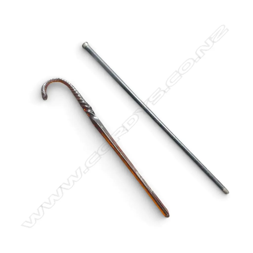 2 ANTIQUE WALKING STICKS: dark amber glass - broken + ebony w silver top Image 1++