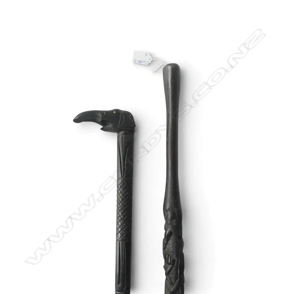 2 VINTAGE AFRICAN EBONY CARVED WALKING STICKS: 1 w figures + 1 w elephant handle. Trunk end faulted Image 1++