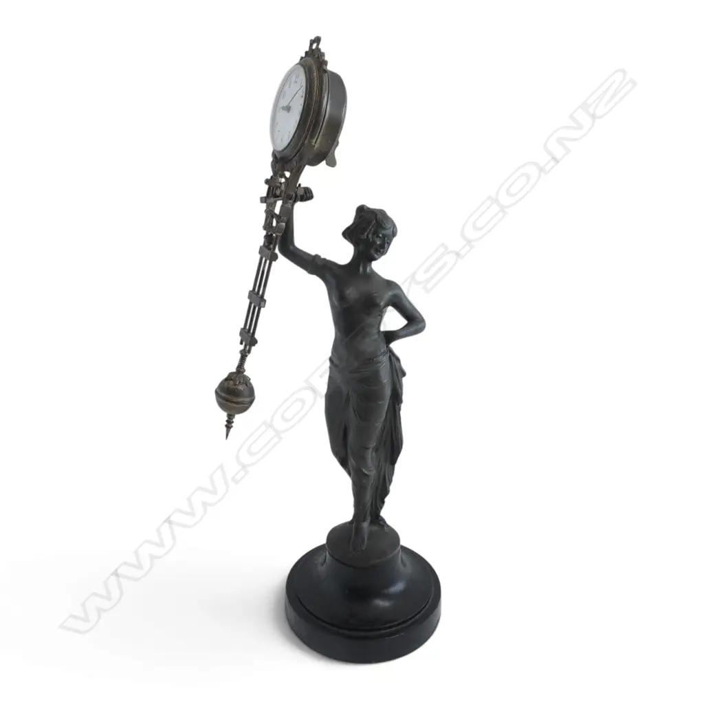 ART DECO STYLE BRONZED SPELTER MYSTERY CLOCK mounted to turned wood base, signature H.390mm Image 1++