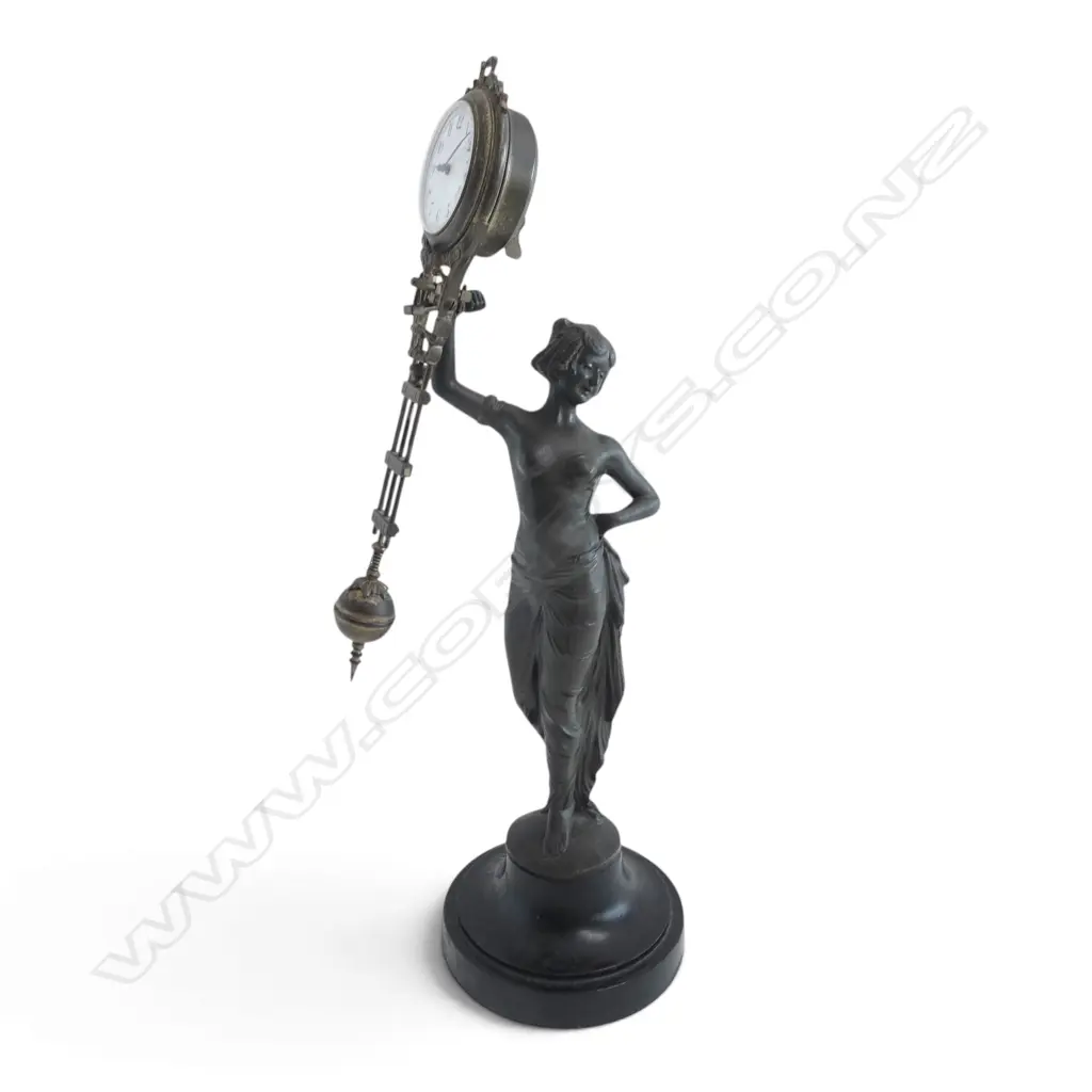 ART DECO STYLE BRONZED SPELTER MYSTERY CLOCK mounted to turned wood base, signature H.390mm Image 1++